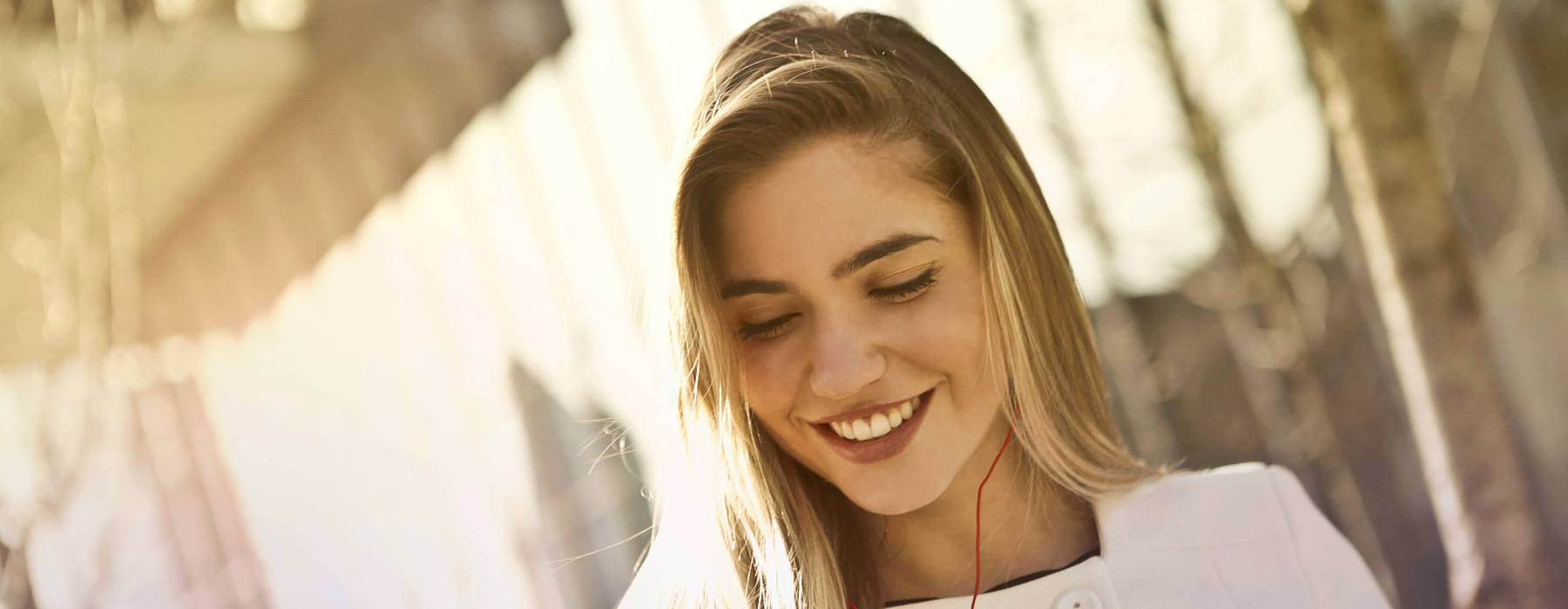 a woman holding a phone