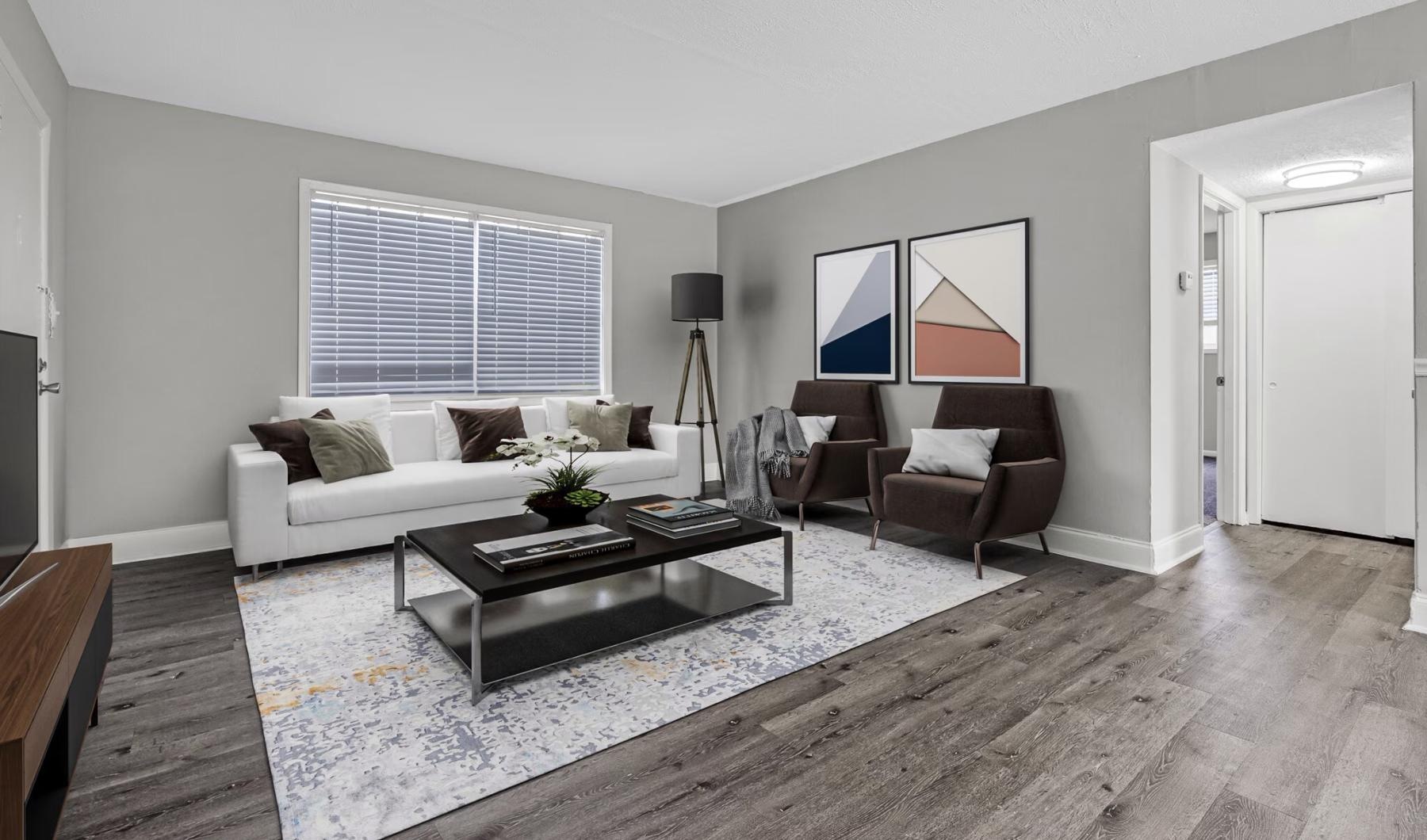 a living room with a couch and coffee table